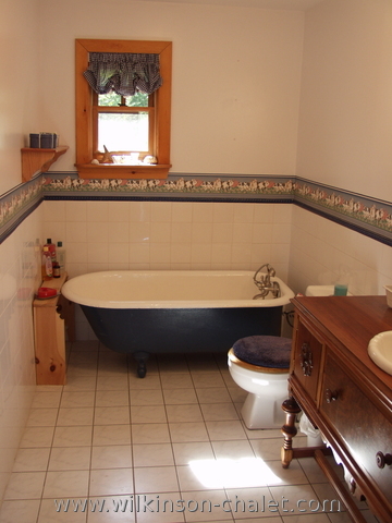 Cottage bathroom clawfoot bathtub,
       Bouchette, Quebec
