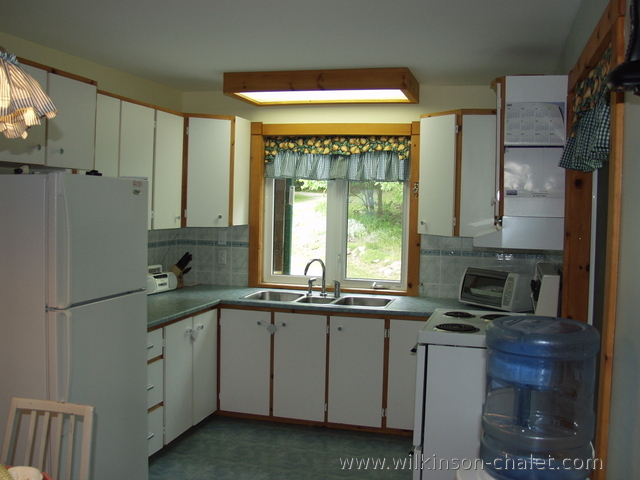Cottage kitchen,
       Bouchette, Quebec