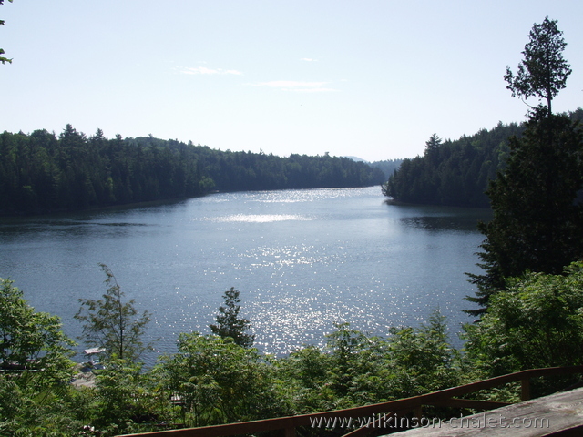 View of Malone Bay from the cottage deck looking East during the Summer,
       Lac des trente et un milles (31 miles lake),
       Bouchette, Quebec